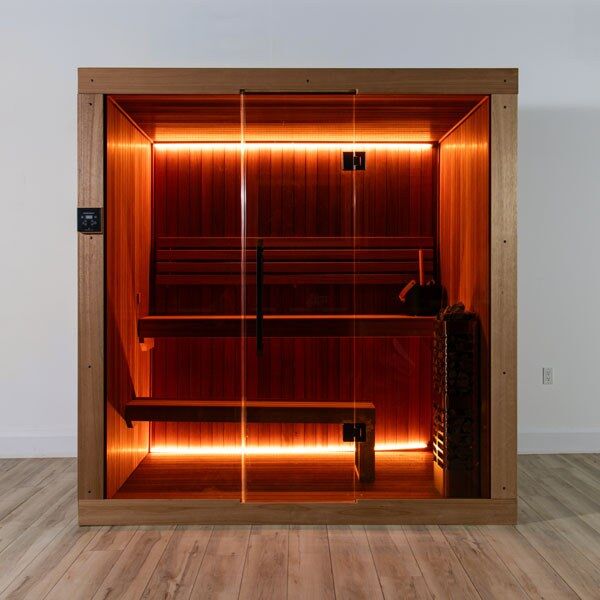 Element Studio indoor sauna front view with glass door, benches, optional lighting and heater (sold separately).
