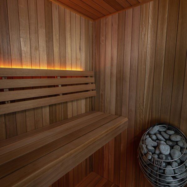 Element Loft indoor sauna interior with wood bench, optional lighting and stone-filled heater (sold separately)